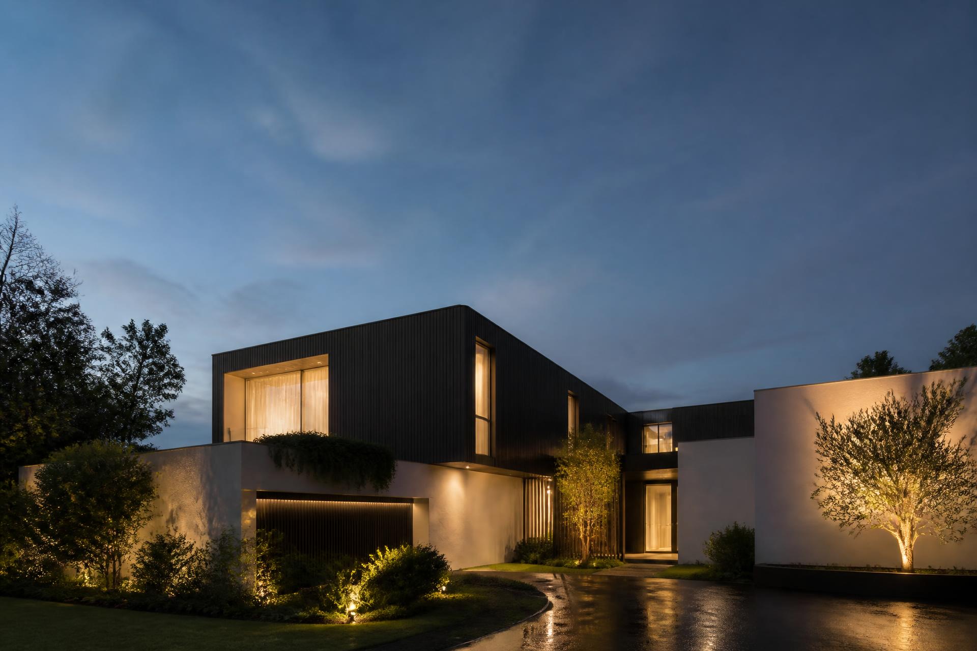 Modern Melbourne luxury home lit at dusk